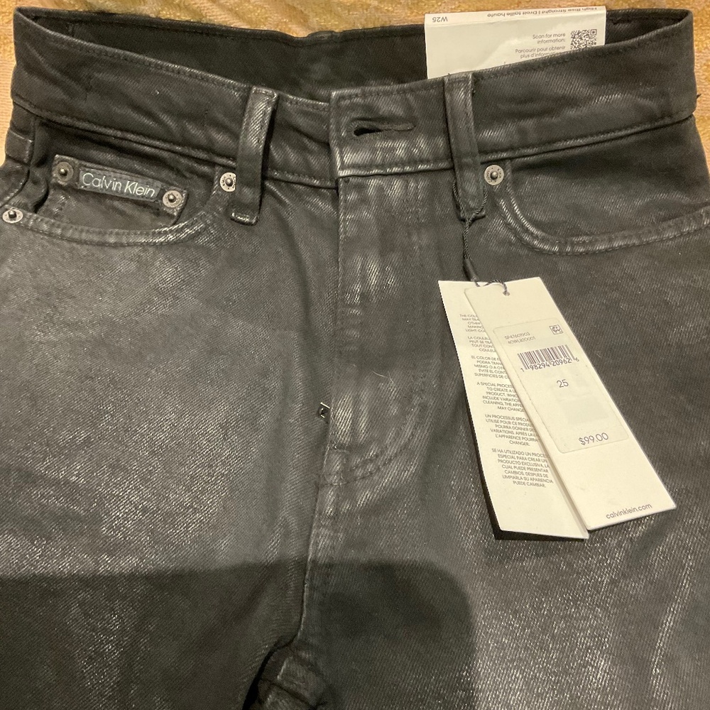 New with tags, black coated Calvin Klein straight jeans
